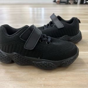 Children’s black sneakers